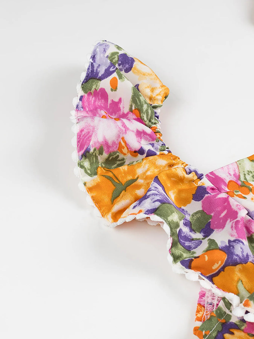 Floral Mini Dress Colorful Print Ruffled Hem Cutout Bow Tied Backless 90887774d7ac47b3a45800af8ff1d369-Max-Origin Trendsi