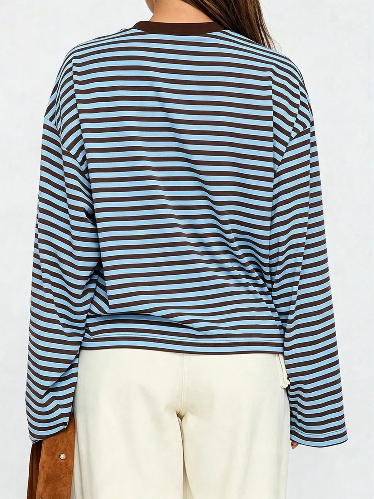 Back view of brown and light blue striped t-shirt displaying consistent horizontal alignment and dropped shoulder design with