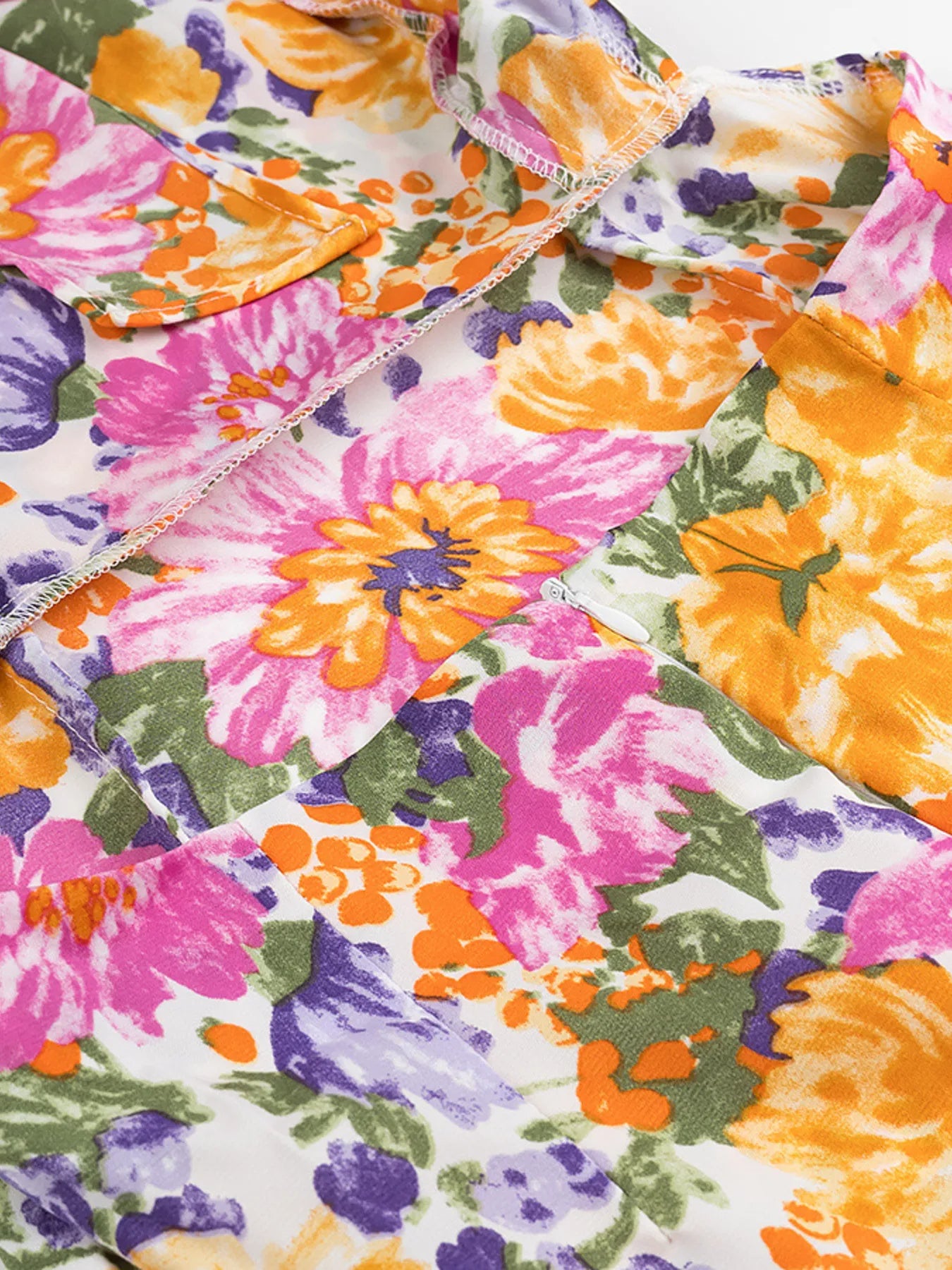 Floral Mini Dress Colorful Print Ruffled Hem Cutout Bow Tied Backless 967559ea30df4b03ba034f2f4857c431-Max-Origin Trendsi