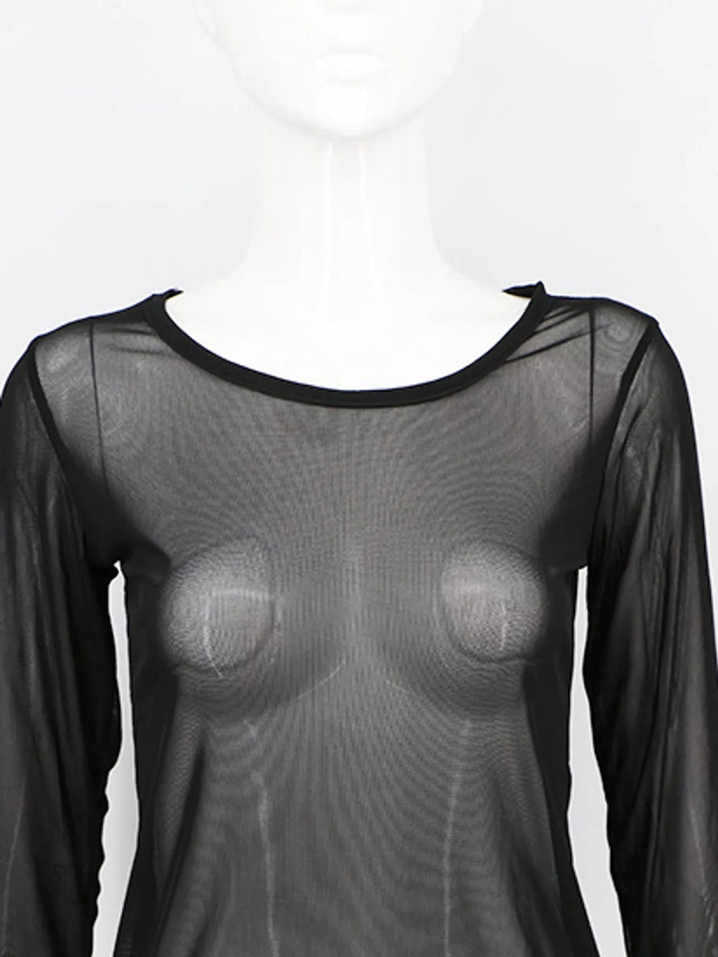 Black mesh top on white mannequin highlighting wide scoop neck with solid trim and fine texture