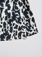 Sexy Minikleid V-Ausschnitt Neckholder Rüschen Ärmellos Cutout Leopard Blumenmuster Rückenfrei