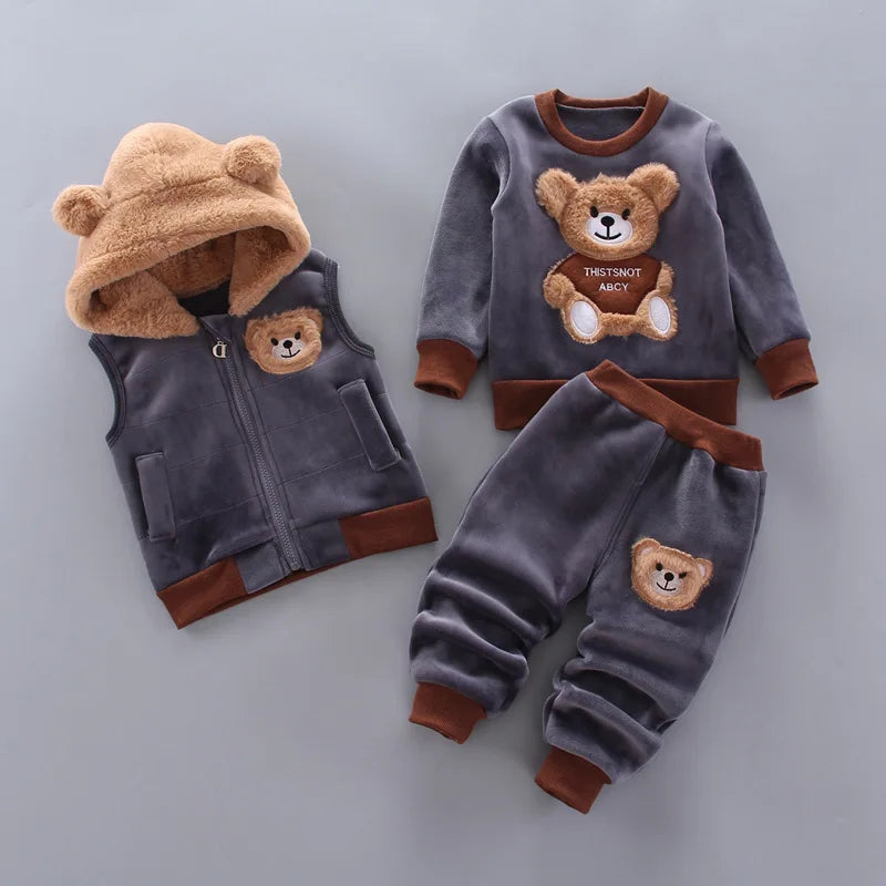 Grey toddler fleece ensemble with fuzzy bear-ear hood, large teddy bear graphic, and coordinating patches