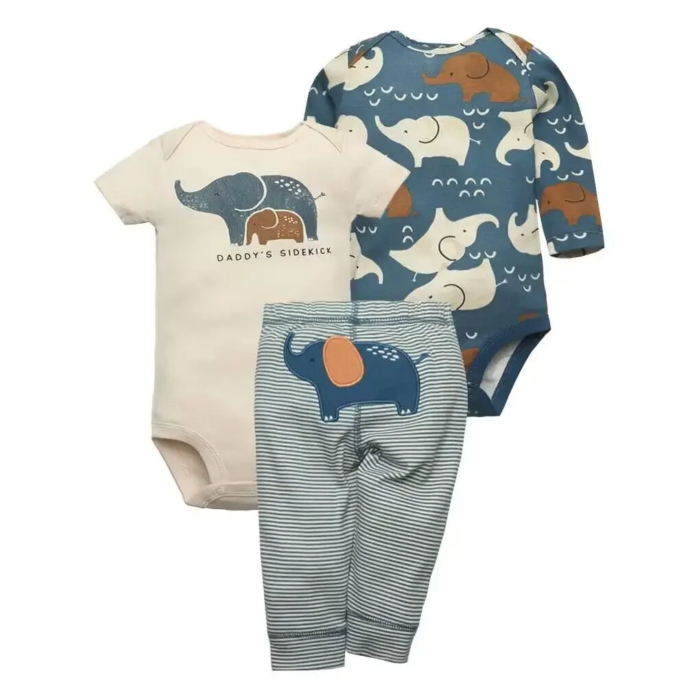 Cream bodysuit with blue elephant graphic, navy long-sleeve elephant print top, and grey striped pants with blue applique