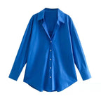 Camicia casual maniche lunghe azzurro elettrico con chiusura monogonna e design dritto