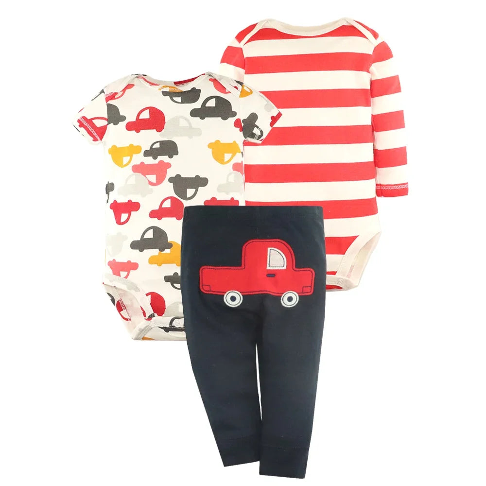 White car print bodysuit, red striped long-sleeve top, and navy blue pants with large red truck applique
