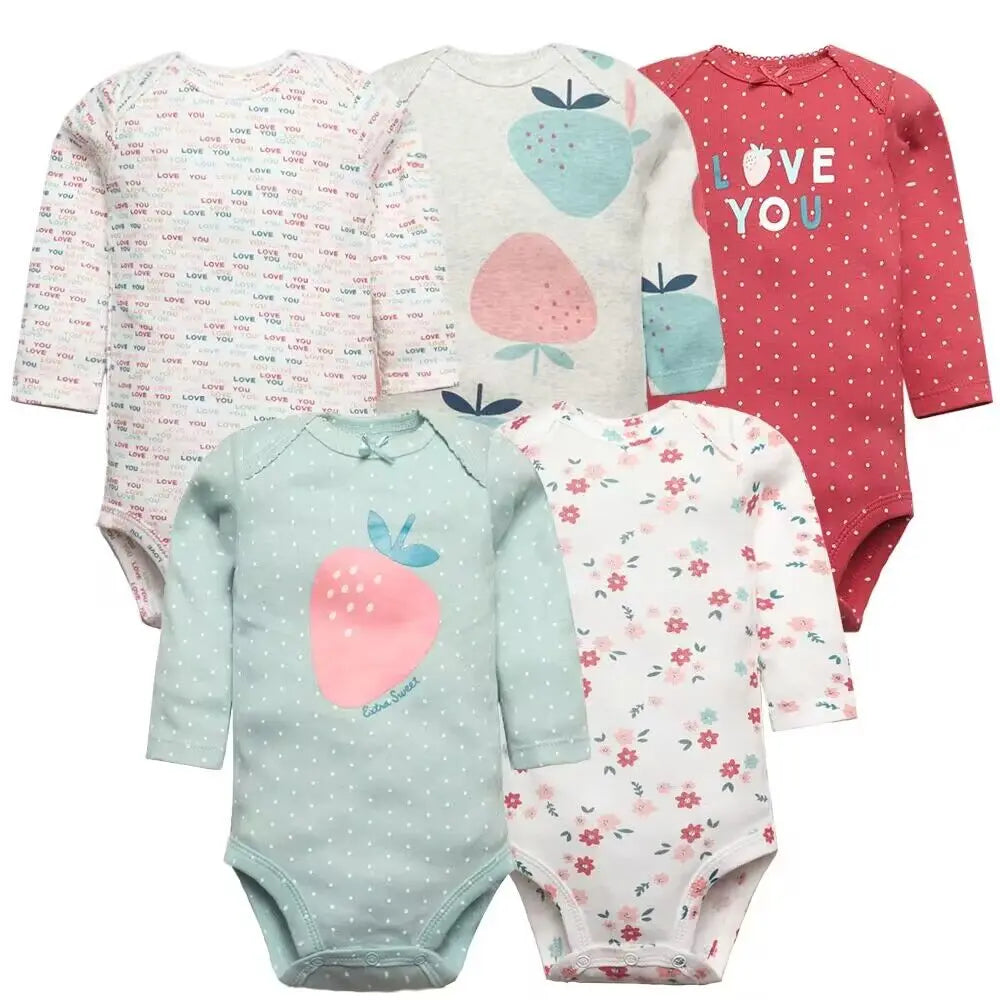 Five playful long sleeve bodysuits with text, strawberry graphics, red dots, and pink floral