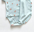 Light blue short-sleeve bodysuit with watermelon slice print, side snap closure, and ribbed leg openings