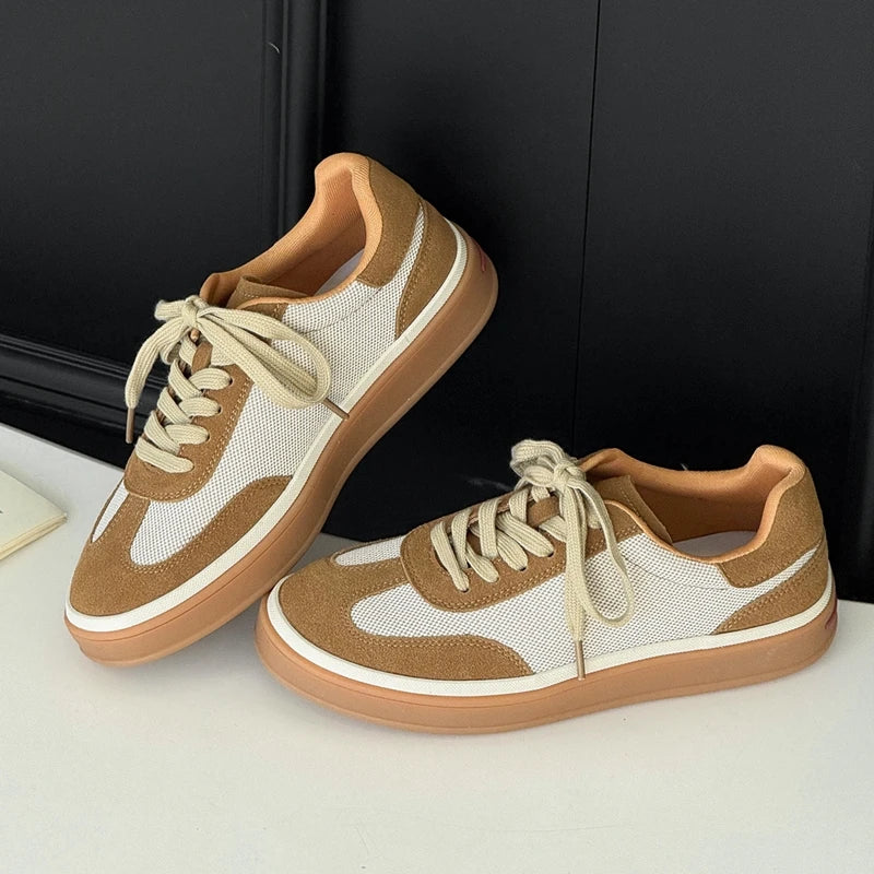 Brown and white sneakers showing side profile, mesh uppers, caramel suede accents, and chunky gum sole