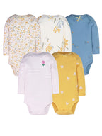 Five long sleeve baby bodysuits in floral, blue hedgehog, pink stripe, and mustard heart prints arranged on white