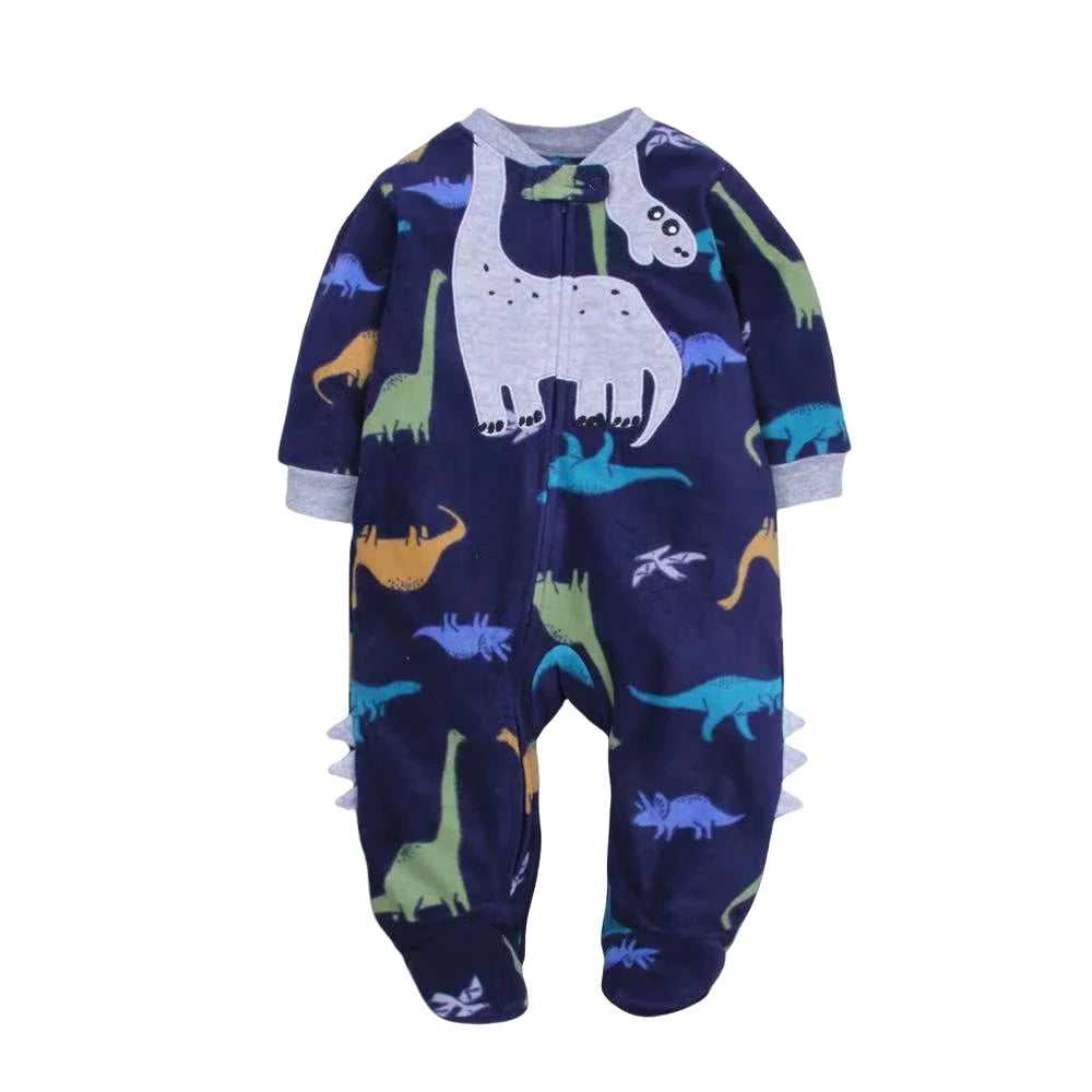 Navy blue footed romper with colorful dinosaur print, white chest graphic, grey ribbed cuffs, and central zipper
