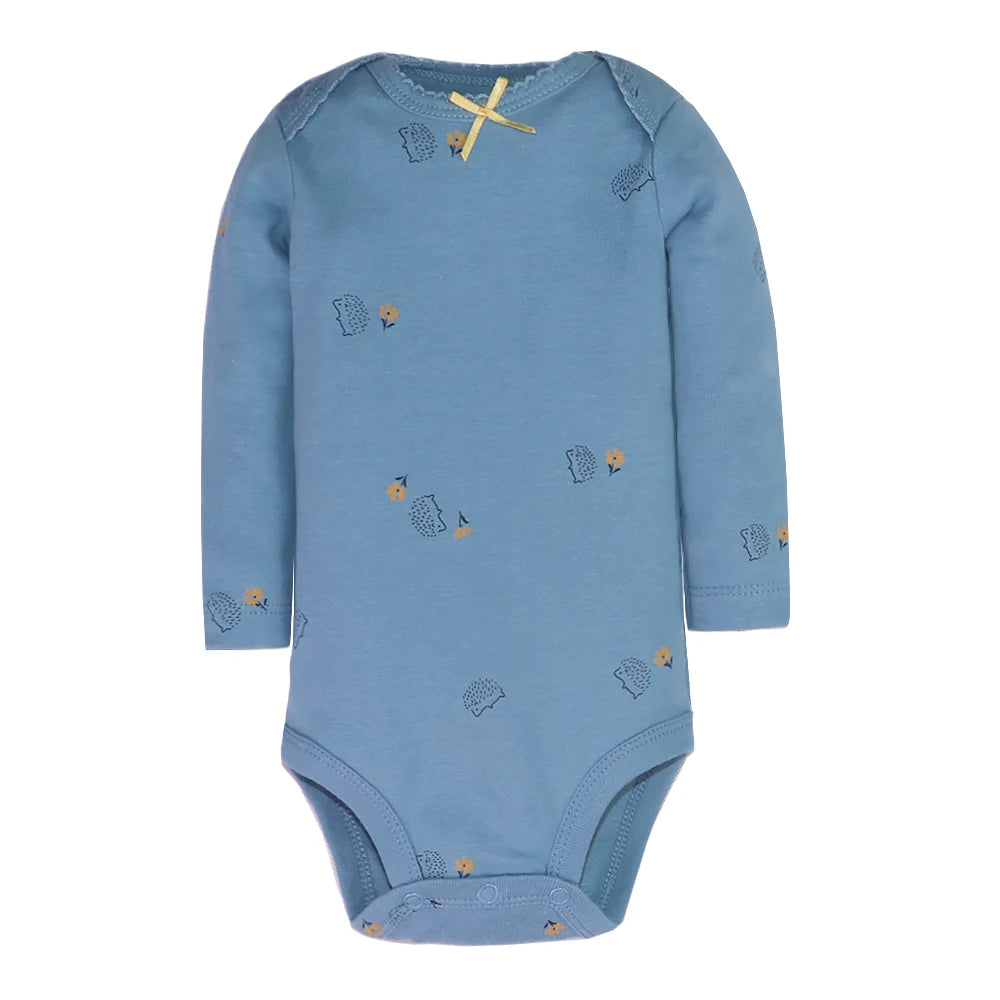 Dusty blue long sleeve bodysuit with dark hedgehog and orange flower print and gold collar tie