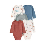 Five earth-tone long-sleeve baby bodysuits featuring dinosaur prints, denim-blue, grey graphic, rust stripes, and brown