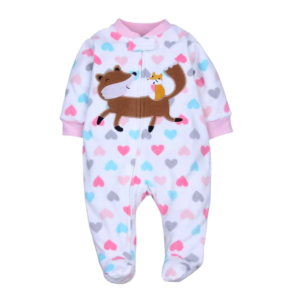 White heart-patterned pajamas featuring brown fox applique with baby fox on tail and soft pink ribbed edges