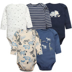 Five long sleeve baby bodysuits in navy, beige, and white with safari prints including rhinos, zebras, and arrows