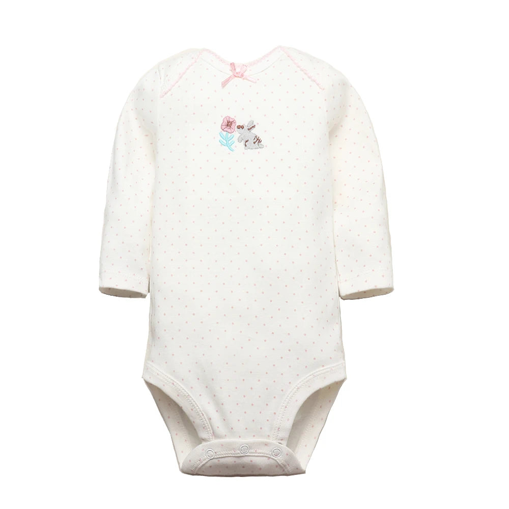 Cream long sleeve bodysuit with pink polka dots, embroidered grey bunny, pink flower, and white snaps