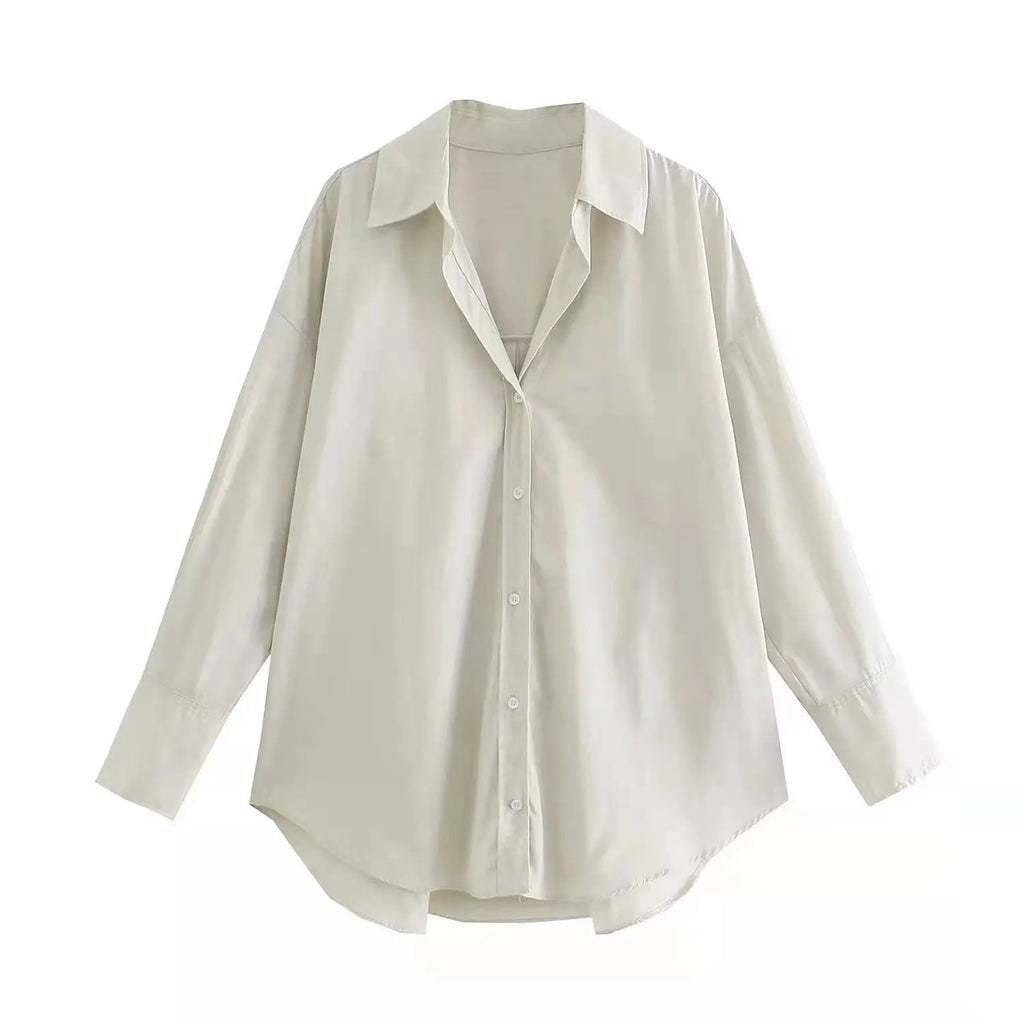 Camicia maniche lunghe oversize avorio opaco con finitura lucente e stile taglio allungato moderno
