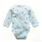 Back view of light blue cotton onesie showing continuous watermelon pattern on torso and sleeves