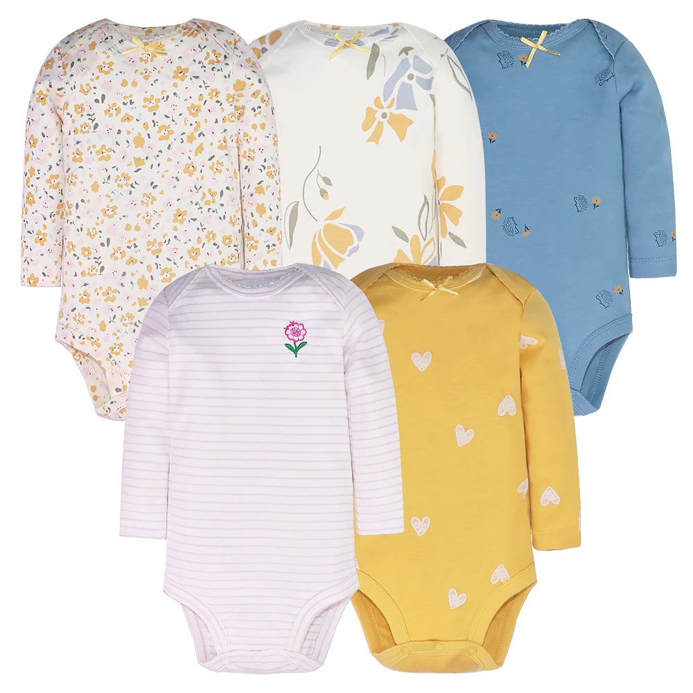 Five long sleeve bodysuits showing floral, hedgehog, striped, and heart patterns on white background