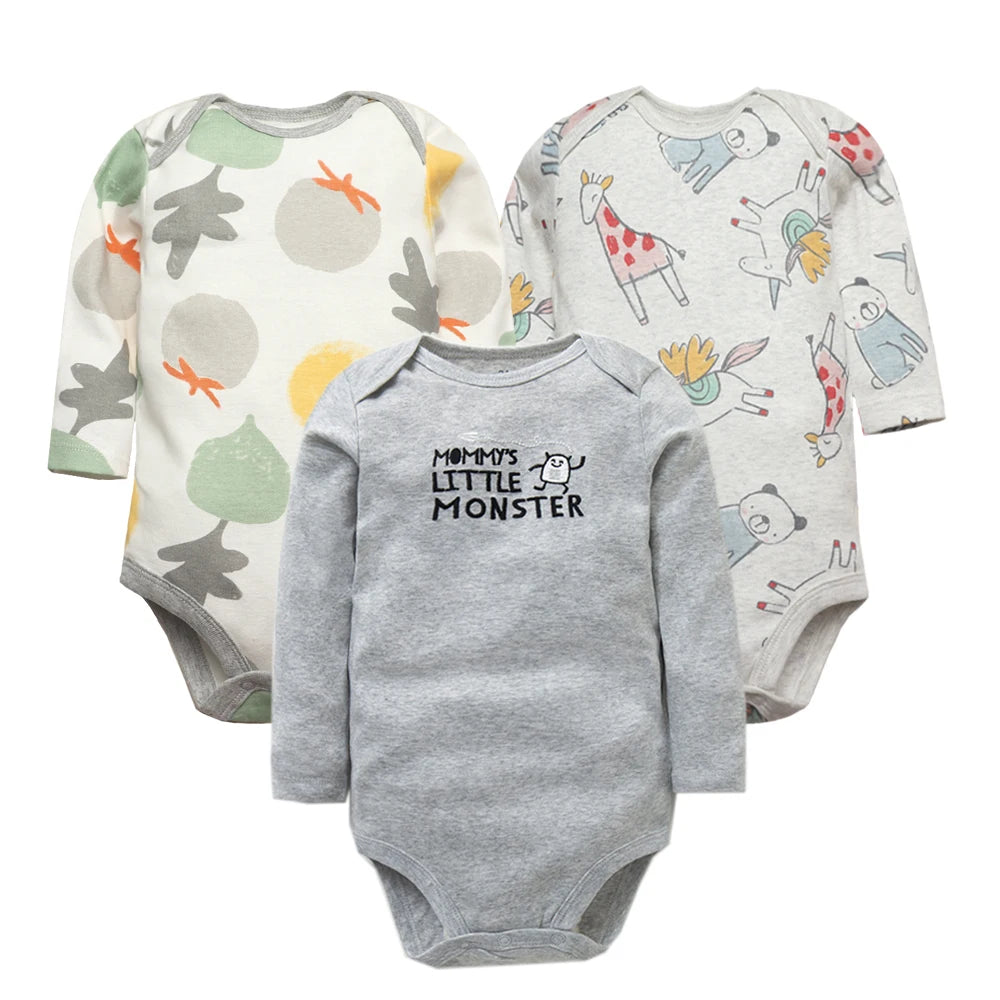 Three-pack set featuring monster text, abstract leaf patterns, and colorful cartoon animal prints on bodysuits