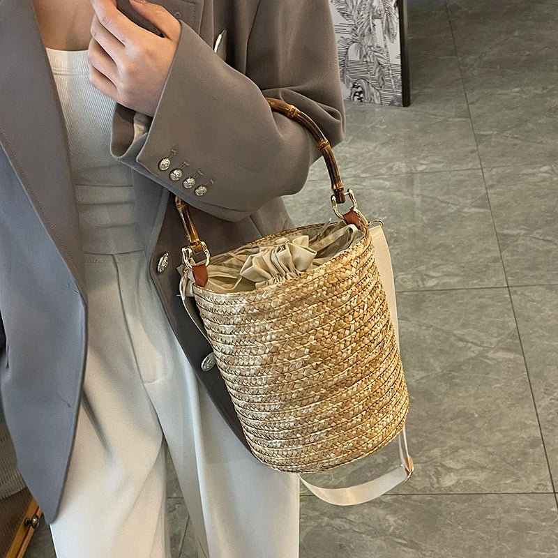 Small Straw Bucket Crossbody Bag for Women - Summer 2025 Sda8dc30215764c23abd25d6d7adbae3bG STYLEINGER