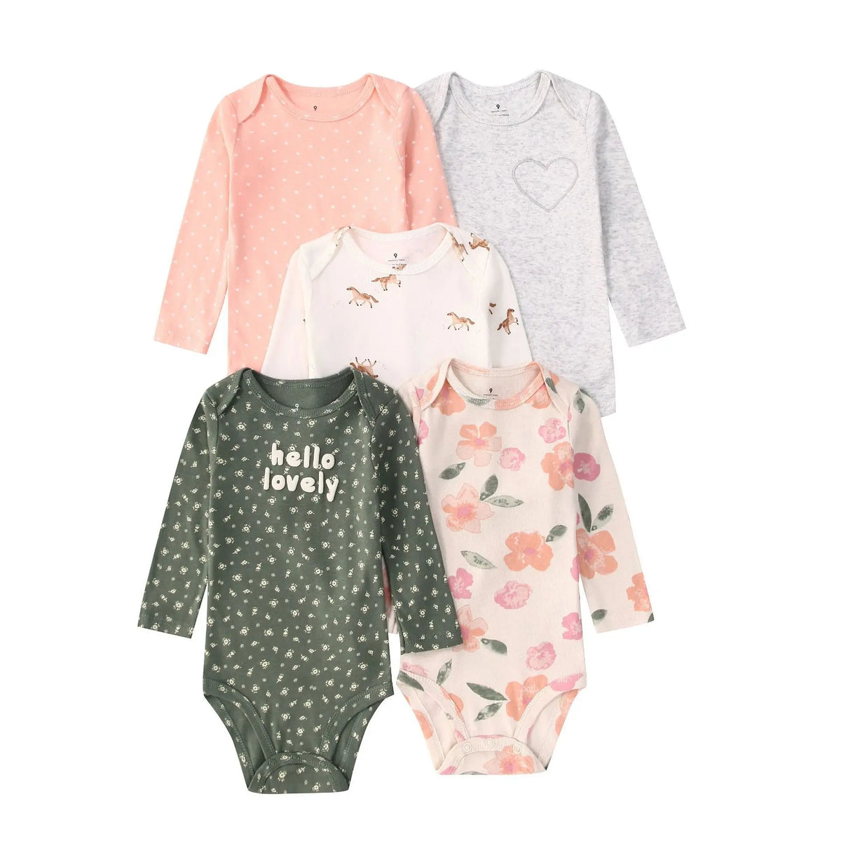Flat-lay of five pastel and earth-tone long-sleeve baby bodysuits: peach polka dots, grey heart outline, cream horse, dark