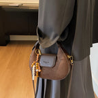 Women's Retro PU Leather Small Saddle Bag – Crossbody Shoulder Handbag with Pendant
