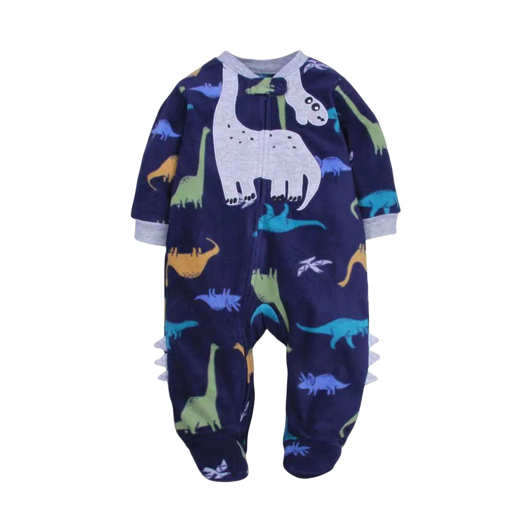 Navy blue romper with colorful dinosaur print, large white Brachiosaurus appliqué, and decorative leg spikes