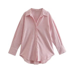 Camicia righe verticali rosa e bianco con design drop-shoulder e variazione pattern testurizzato