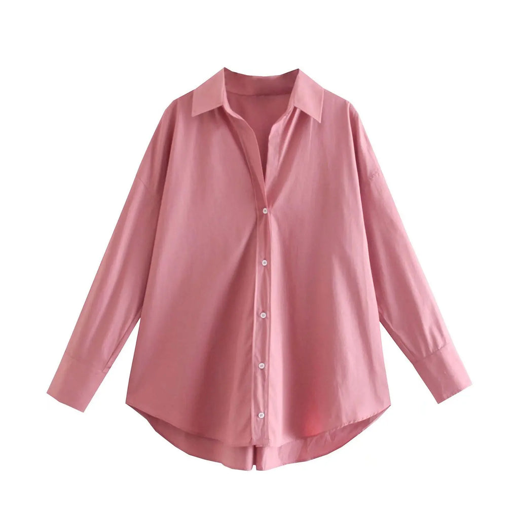 Camicia rosa antico vista dall'alto che presenta texture tessuto liscia e stile collo appuntito standard