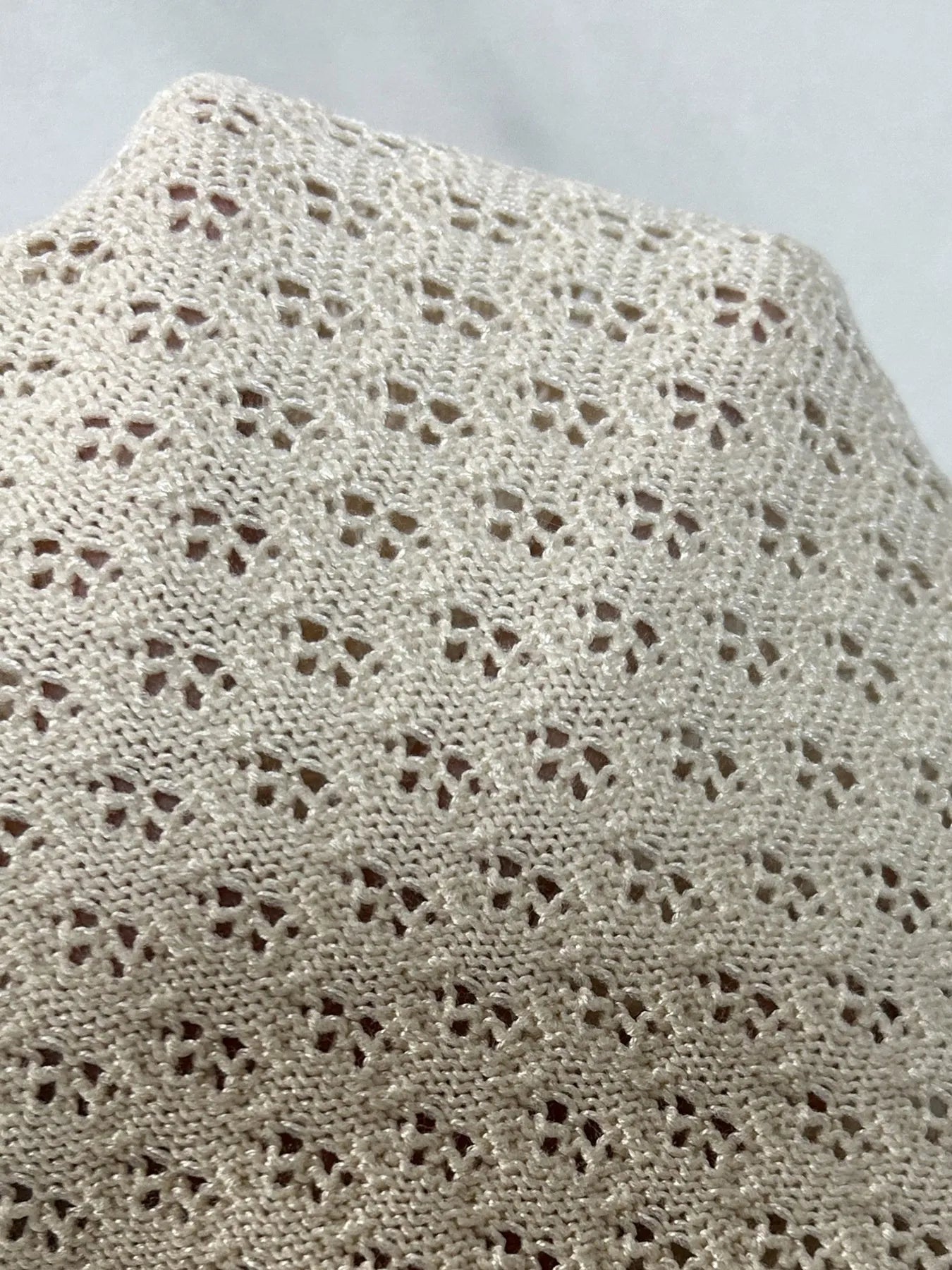 Women's Sweater Set Openwork Knit Button Up Short Sleeve Top and Mini Skirt a57a7f131d644a44afdd718fb2eca14b-Max-Origin Trendsi