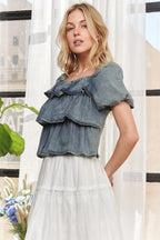 ADORA Ruffle Blouse Denim Washed Layered Short Puff Sleeve Top a9a4ba6020e44d4db79f4edde9d05d00-Max-Origin Trendsi