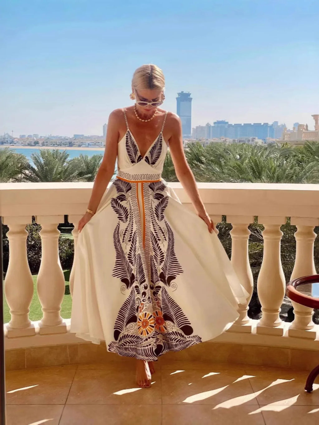 Cami Maxi Dress Apricot Leaf Printed V-Neck Cutout Backless Crisscross a9c82dc3cbaa46e4a683ea28e11dcee4-Max-Origin Trendsi