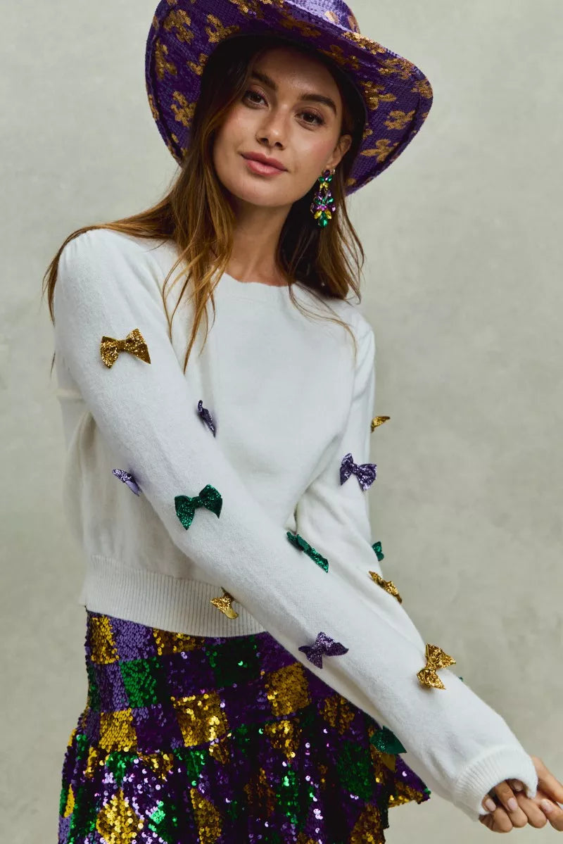 SO ME Sweater Knit Top Mardi Gras Glitter Bow Ribbon Ivory abd8bf4d271843e19e83720aa552f4d2-Max-Origin Trendsi