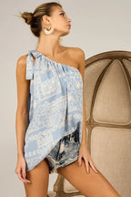 BiBi Top One Shoulder Tied Ribbon Blue Aztec Printed Woven Asymmetrical Blouse ac71a0e307e340b4a45852cc08c5bf6f-Max-Origin Trendsi