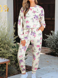Women's Lounge Set Floral Print Round Neck Top and Drawstring Pants 2 Pcs Floral acfd4349-3543-41dc-81ec-55ff4fe67fa2-Max-Origin Trendsi