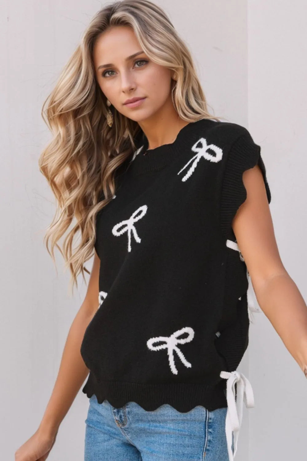 Women's Sweater Black Bow Side Ties Scalloped Hem Cap Sleeve Black b2975623-779f-4c00-95a4-4064360605f9-Max-Origin Trendsi