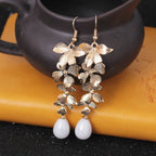 Alloy Flower Earrings Synthetic Pearl Pendant 9K gold-plated Fashion Jewelry b35d9c39-fbcc-4228-9bc1-603e98905754-Max Trendsi