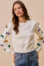 SO ME Sweater Knit Top Mardi Gras Glitter Bow Ribbon Ivory b3c082118ca64fc888f199075be943f6-Max-Origin Trendsi