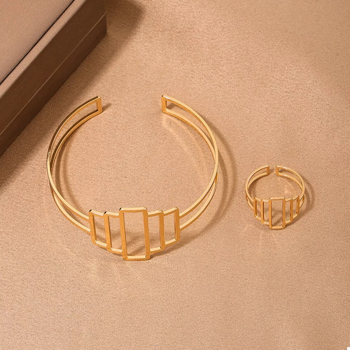 Open Bracelet and Ring Jewelry Set 18K Gold-Plated Gold 2 Pcs b89f063f-a8da-424e-9781-606bcb218445-Max-Origin Trendsi