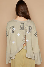 POL V-Neck Top Peace Round Patch Embroidered Exposed Seam Back Ruffle b9468f09-4608-4de8-ad0a-d16c492e582f-Max Trendsi