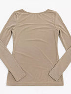 Back view of beige sheer mesh top laid flat showing rounded neckline and ribbed hem stitching
