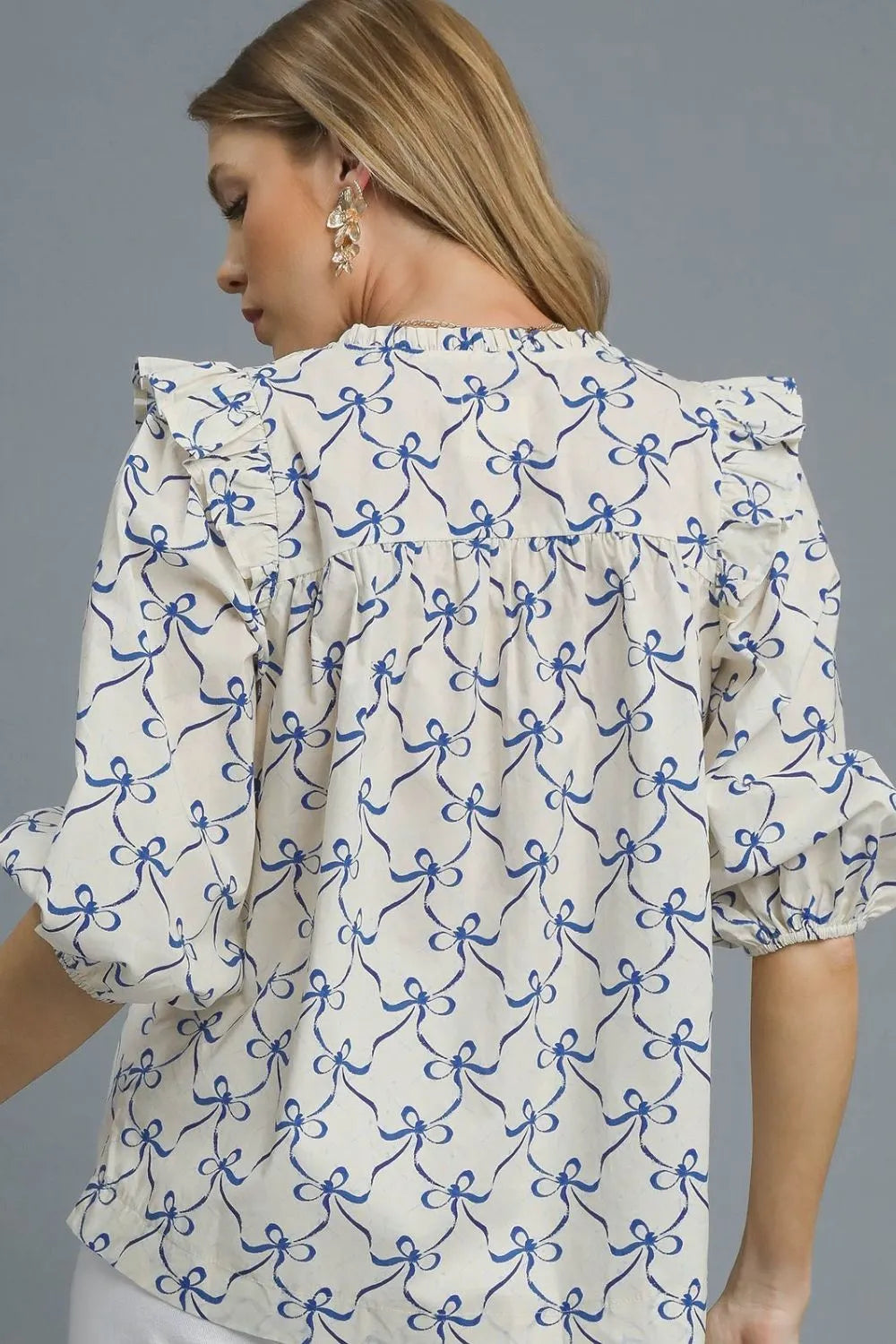 Umgee Blouse Royal Blue Bow Print Smocked Neck Notched Ruffled Top c0354e35-e7af-44d1-b57c-0d30b5868442-Max-Origin Trendsi