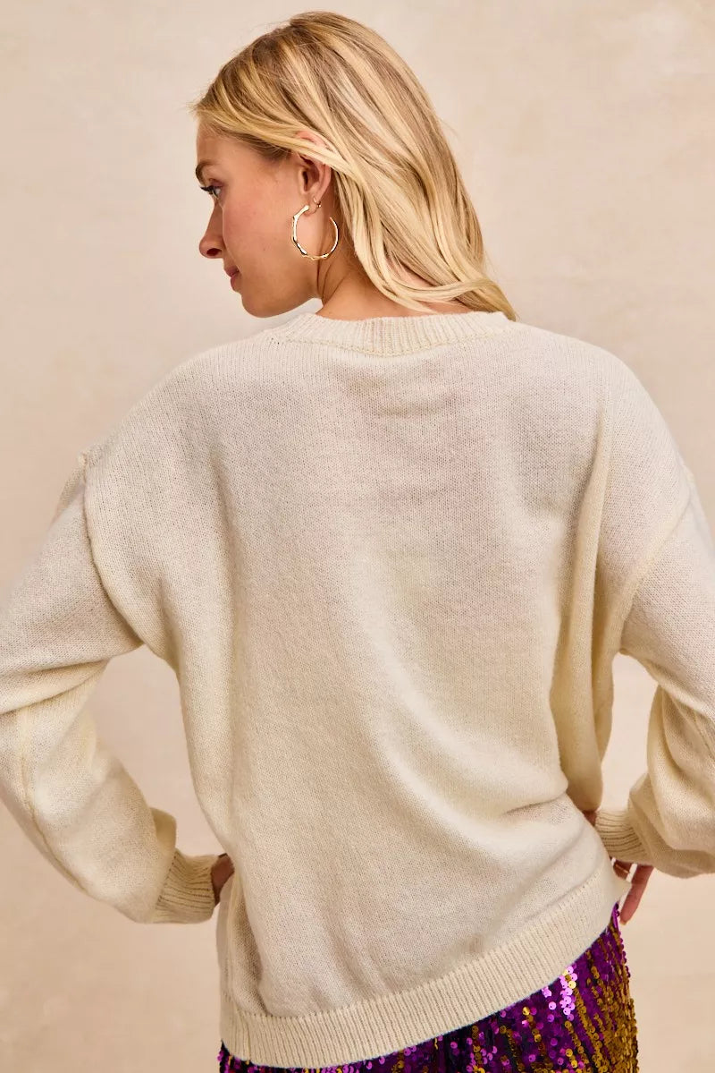 BiBi Women Sweatshirt Ivory Mardi Gras Sequin Lattering Knit Top c04dfc4499714c02bb0e55344160b07a-Max-Origin Trendsi