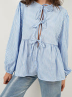 Blouse Front Tied Round Neck Long Sleeve Cotton Blend Tops c0634c83-f735-400e-bf09-d95e112bcbd8-Max_078aa7d7-e71a-4596-b419-4802d78e10c7 Trendsi