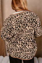 Rear view showing continuous leopard print pattern and rounded hem trimmed in tan corduroy fabric