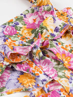 Floral Mini Dress Colorful Print Ruffled Hem Cutout Bow Tied Backless c8aaaaa3-903c-4133-9663-67dc72a98111-Max-Origin Trendsi