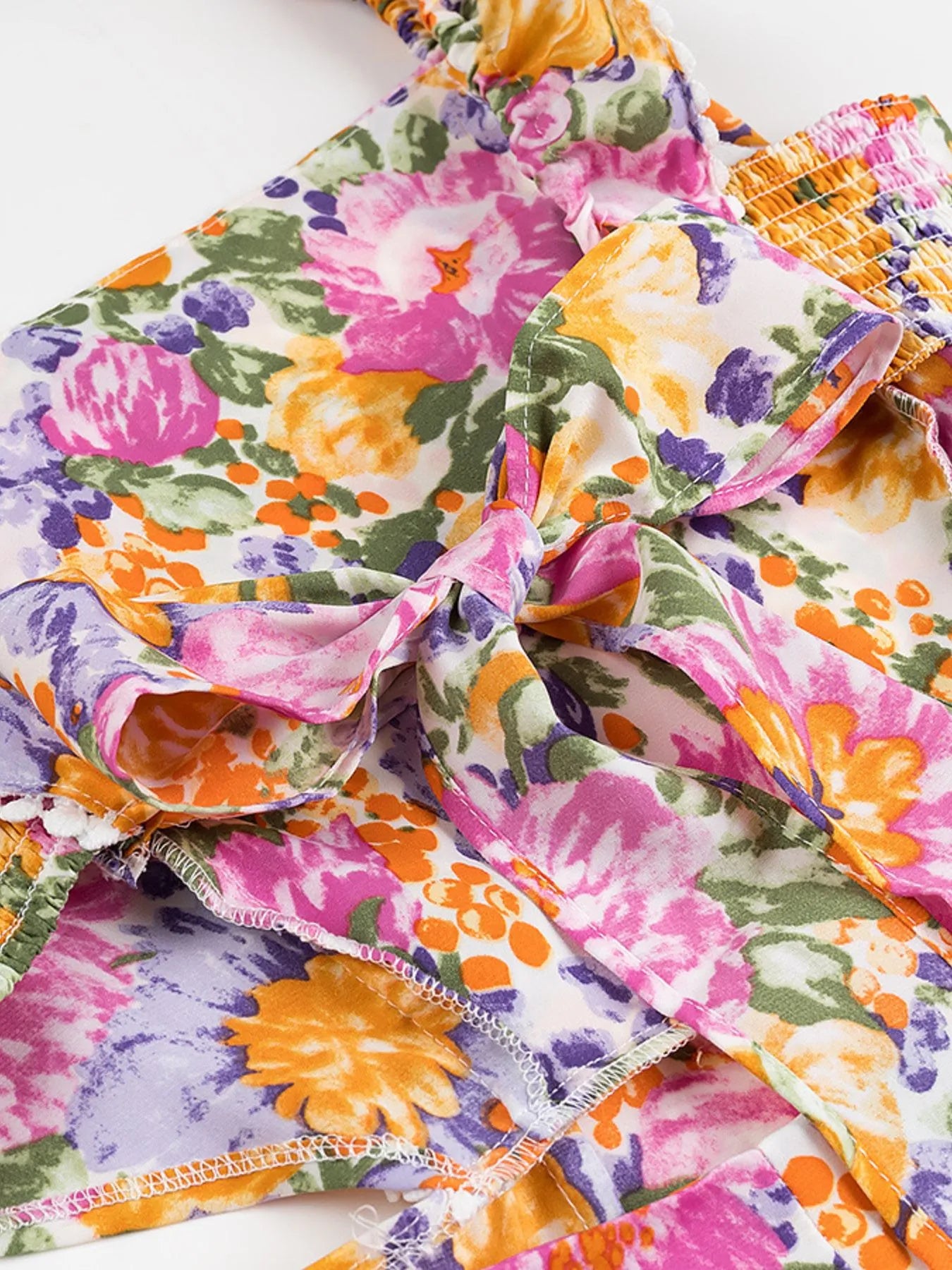 Floral Mini Dress Colorful Print Ruffled Hem Cutout Bow Tied Backless c8aaaaa3-903c-4133-9663-67dc72a98111-Max-Origin Trendsi