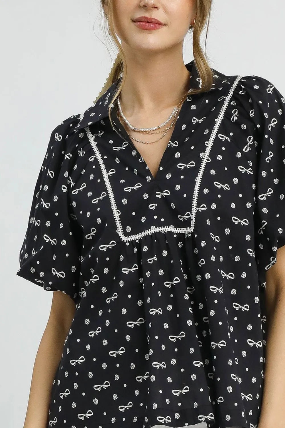 Umgee Blouse Black Bow Print Puff Short Sleeve Women's Top c90cfe55-6d9c-418e-8207-65eb211482a7-Max-Origin Trendsi