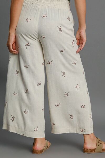 Umgee Linen Blend Pants Bow Embroidered Plus Size Lace Drawstring Wide Leg cd6bc60c-0cdd-426e-91d5-a17d559df3d9-Min Trendsi