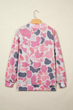 Back view of all-over pink and grey abstract camo patterned sweatshirt without graphics